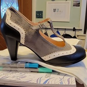 Wing tip Mary Jane heels